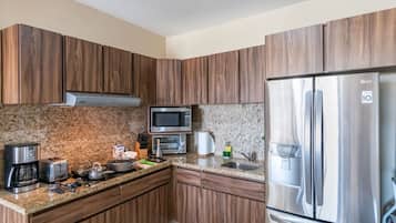 Fridge, microwave, stovetop, coffee/tea maker