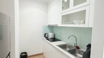 Deluxe Apartment, City View | 2 bedrooms, free minibar items, in-room safe, desk