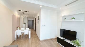 Deluxe Apartment, City View | Free minibar items, in-room safe, desk, blackout curtains