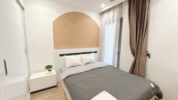 Deluxe Apartment, City View | 2 bedrooms, free minibar items, in-room safe, desk