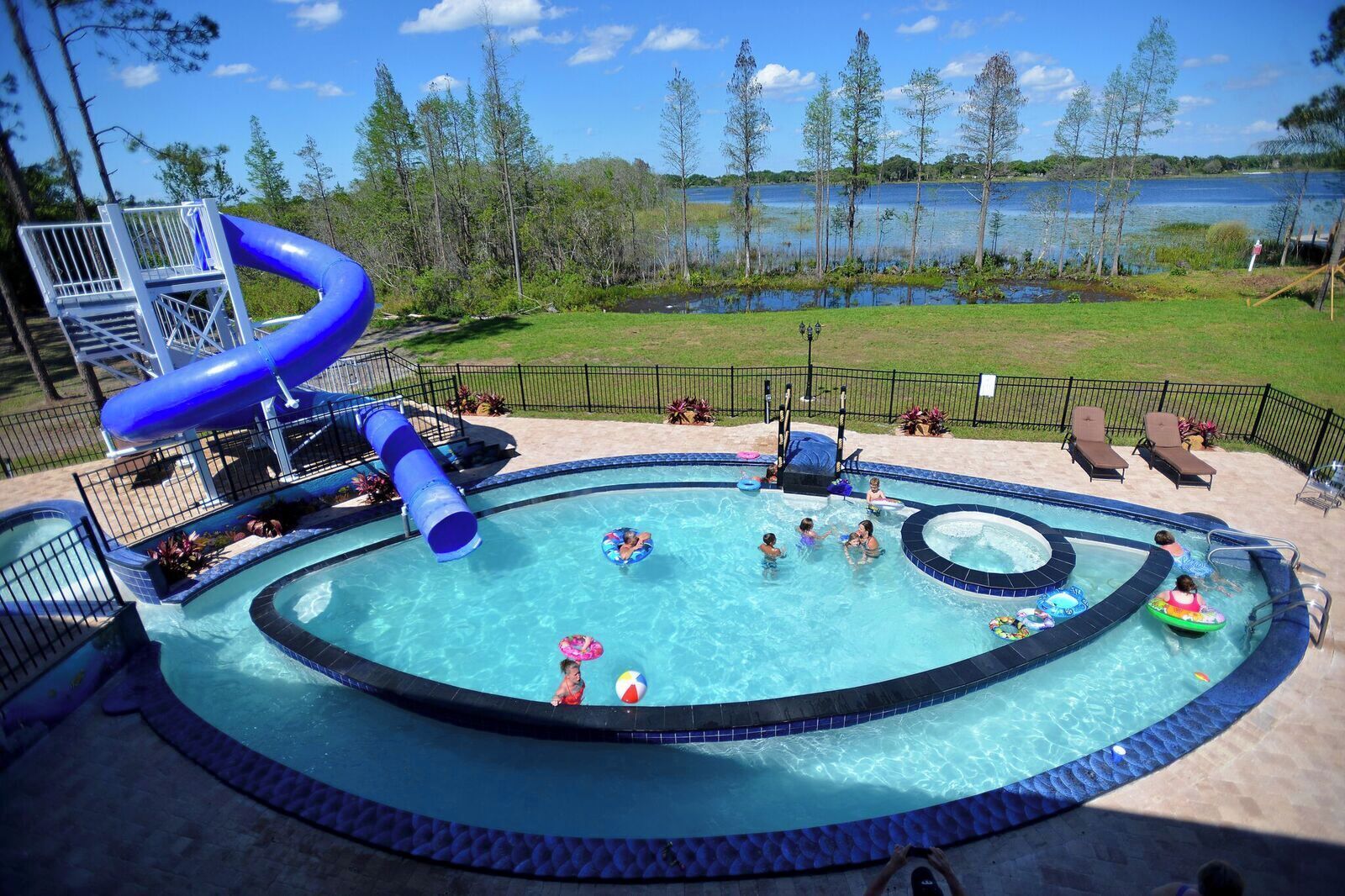 Up to 45 People Can Stay At This Lakefront GAME-FILLED Mansion on 10 Gated Acres