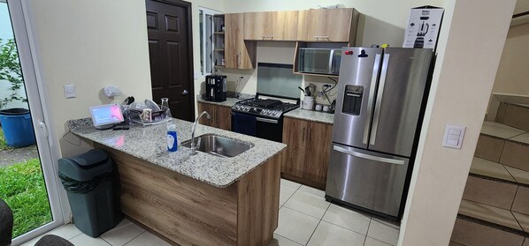 Fridge, microwave, oven, stovetop - Brand new house great location. (San Salvador)