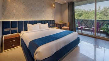 Deluxe Double Room | In-room safe, desk, laptop workspace, blackout drapes