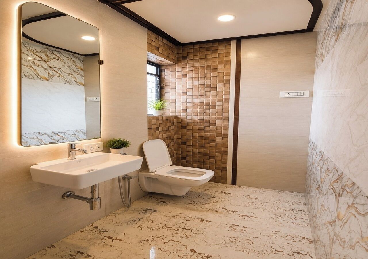 A bathroom with a sink, toilet, and a mirror.