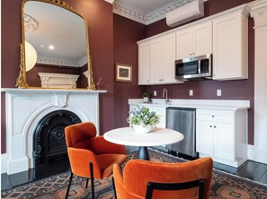 Fridge, microwave, coffee/tea maker, cookware/dishes/utensils