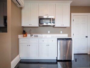 Microwave, coffee/tea maker, cookware/dishes/utensils