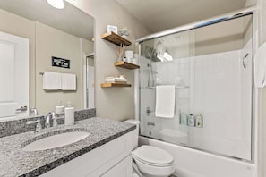 Hair dryer, towels, soap, shampoo
