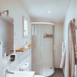 Shower, hair dryer, towels, soap