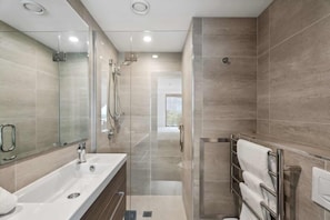 Shower, hair dryer, towels