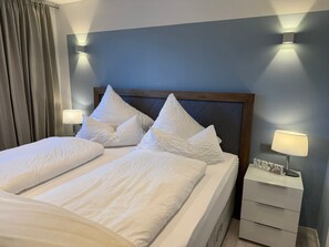 1 habitación, tabla de planchar con plancha, wifi gratis y ropa de cama 