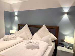 1 habitación, tabla de planchar con plancha, wifi gratis y ropa de cama 