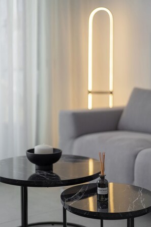 Deluxe Suite, Balcony, City View | Living area