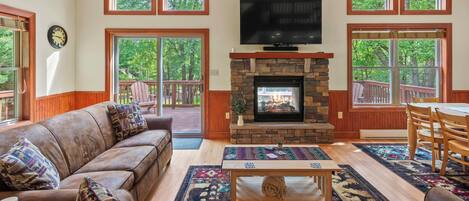 TV connectée, cheminée, table de tennis de table