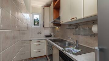 Standard Apartment, 2 Bedrooms (Seaview City Apartment Frida) | Private kitchen | Fridge, oven, stovetop, dishwasher