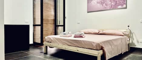 2 habitaciones y ropa de cama