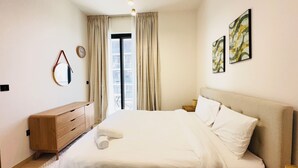 1 bedroom, iron/ironing board - OYO 1290 Home Fully Furnished 1bed Apartment @JVC (Dubai)