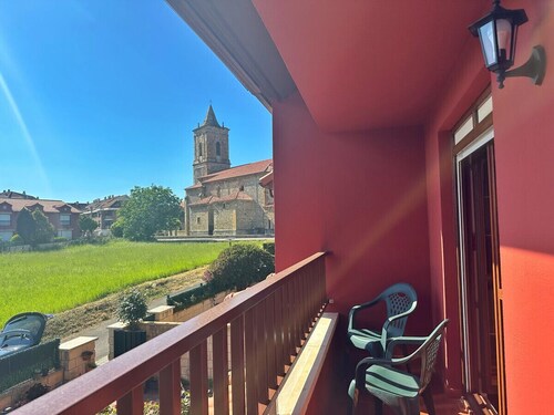 Semi-detached house with private garden and communal pool