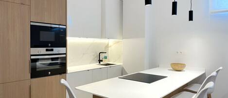 Fridge, microwave, coffee/tea maker, highchair