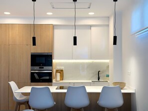 Fridge, microwave, coffee/tea maker, high chair