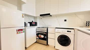 Apartment | Private kitchen | Fridge, electric kettle