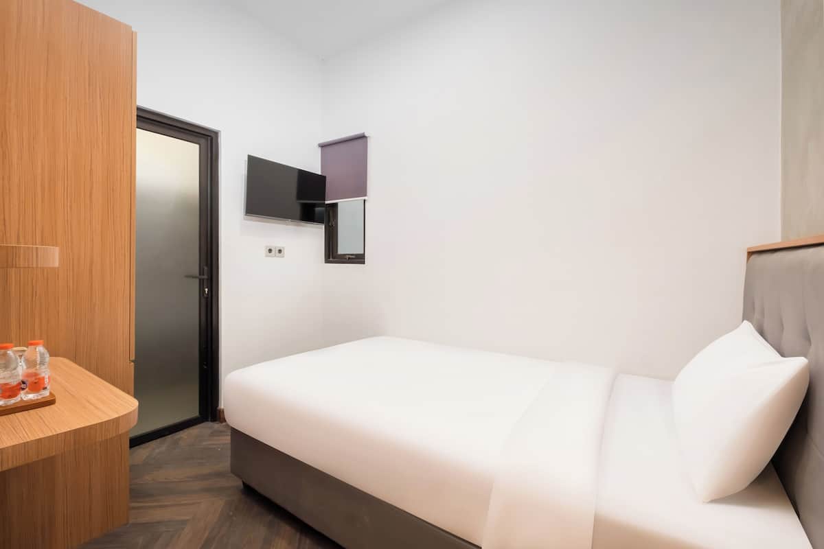 Habitación individual Deluxe | Wifi gratis y ropa de cama
