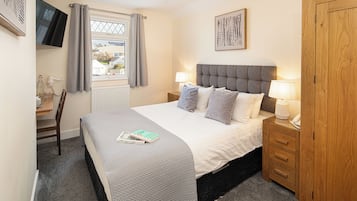 Economy Room | 1 bedroom, iron/ironing board, free WiFi, bed sheets