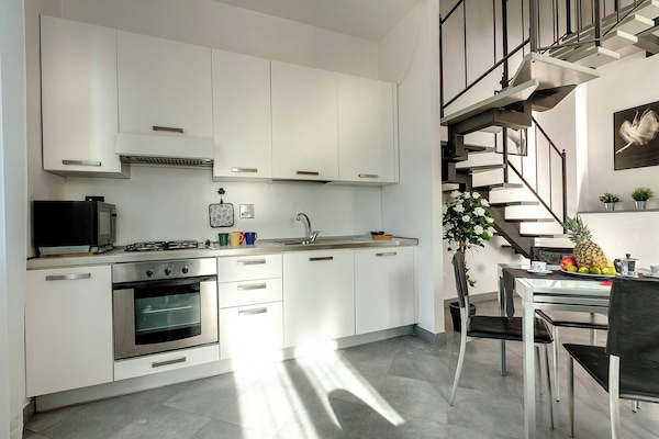 Apartment | Private kitchen | Full-size fridge, microwave, stovetop, cookware/dishes/utensils