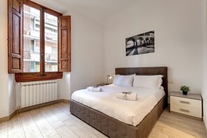 Apartamento | Tabla de planchar con plancha, wifi gratis, ropa de cama