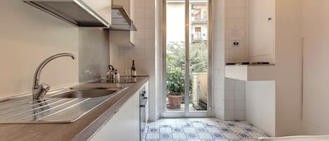 Apartment | Private kitchen | Full-sized fridge, microwave, oven, stovetop