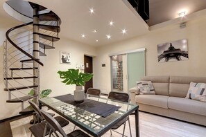 Apartment | Living area | 24-inch flat-screen TV with digital channels - Mamo Florence - Calzaiuoli Apartments (Florence)