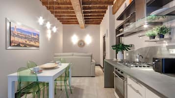 Apartment | Living area | 24-inch flat-screen TV with digital channels