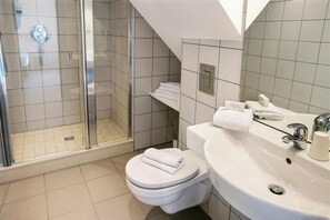 Shower, free toiletries, hair dryer, towels