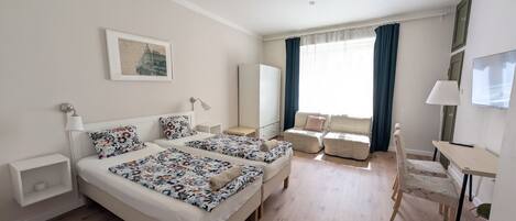 1 dormitori, planxa i posts de planxar, wifi gratuïta i roba de llit