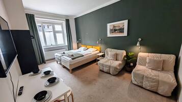 2 dormitorios, tabla de planchar con plancha, wifi gratis y ropa de cama