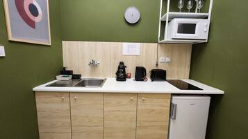 Fridge, microwave, cookware/dishes/utensils