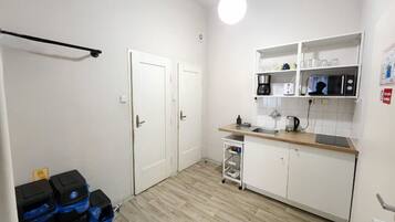 Fridge, microwave, stovetop, coffee/tea maker