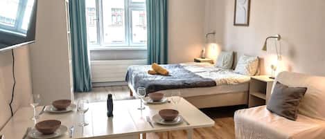 2 dormitorios, tabla de planchar con plancha, wifi gratis y ropa de cama