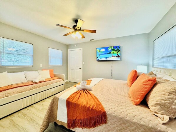 1 bedroom, desk, iron/ironing board, travel crib