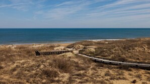 A coastal pathway leading to the beach. - FFR209 Beach Hideaway by First Flight Rentals (Kill Devil Hills)