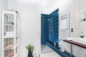 Shower, eco-friendly toiletries, hair dryer, towels