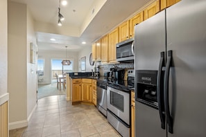 Coffee/tea maker, fridge, microwave, oven