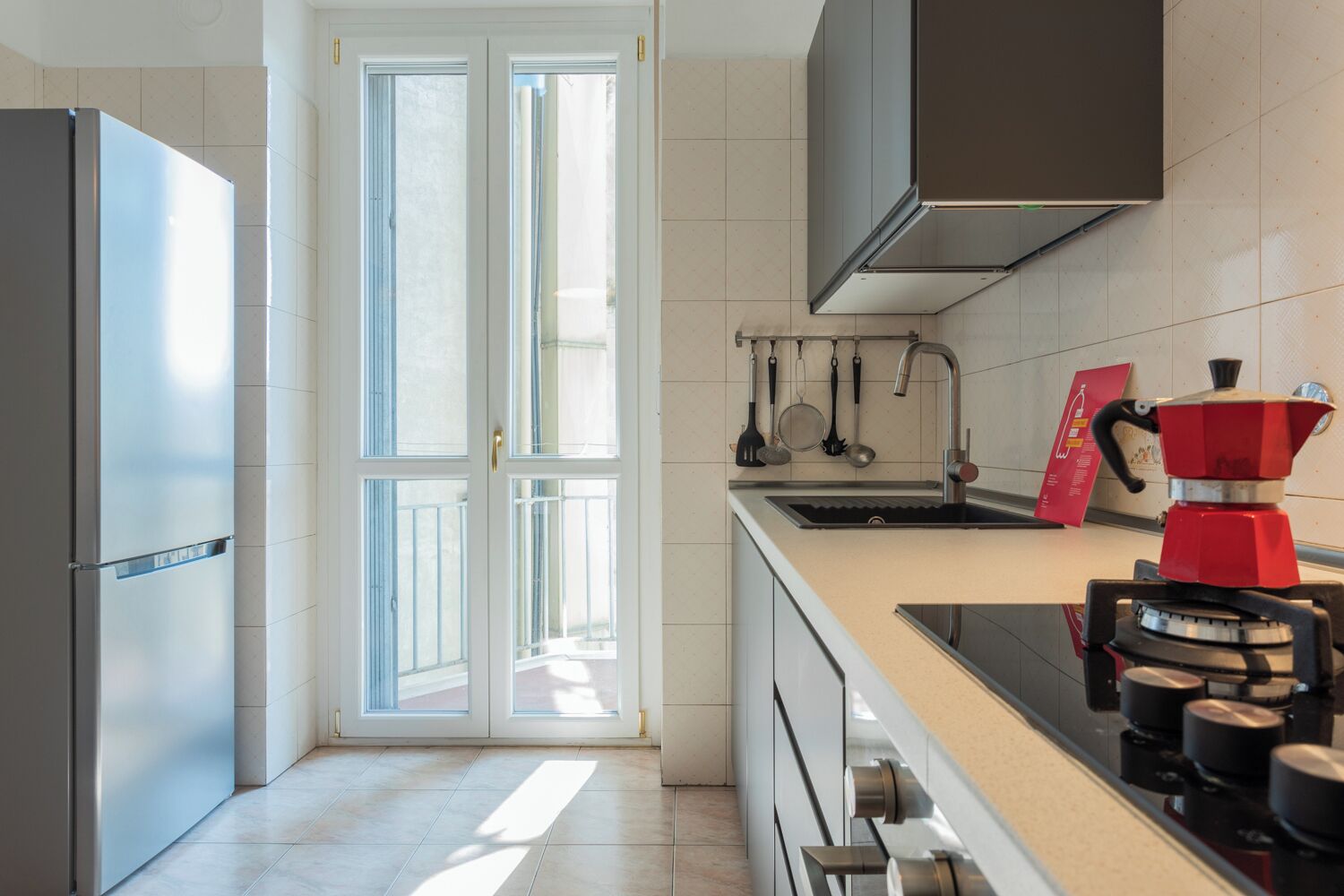 Apartment | Private kitchen | Fridge, microwave, stovetop, dishwasher