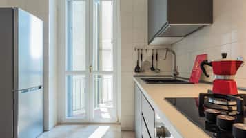 Departamento | Cocina privada | Refrigerador, microondas, parrilla de estufa y lavavajillas