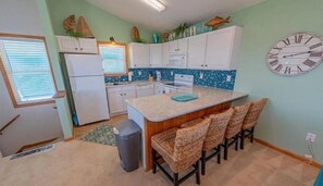 Fridge, microwave, oven, stovetop - KDH2411 Sea Glass Retreat by First Flight Rentals (Kill Devil Hills)