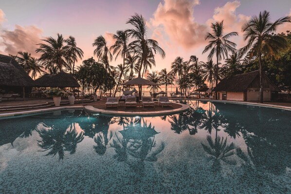 3 outdoor pools, open 6:30 AM to 6:00 PM, pool umbrellas, pool loungers