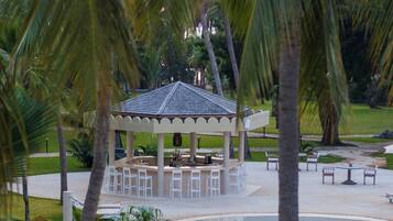 3 outdoor pools, open 6:30 AM to 6:00 PM, pool umbrellas, pool loungers