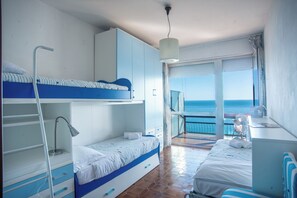 Family Apartment, 1 Bedroom (Sole Surf E Relax) | 1 bedroom, bed sheets