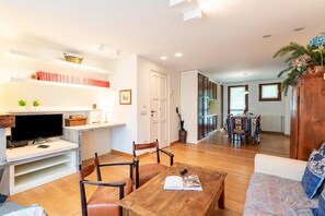 Family Apartment, Multiple Bedrooms, 2 Bathrooms (Plan Gorret Beautiful Flat In) | Living area | Flat-screen TV, fireplace