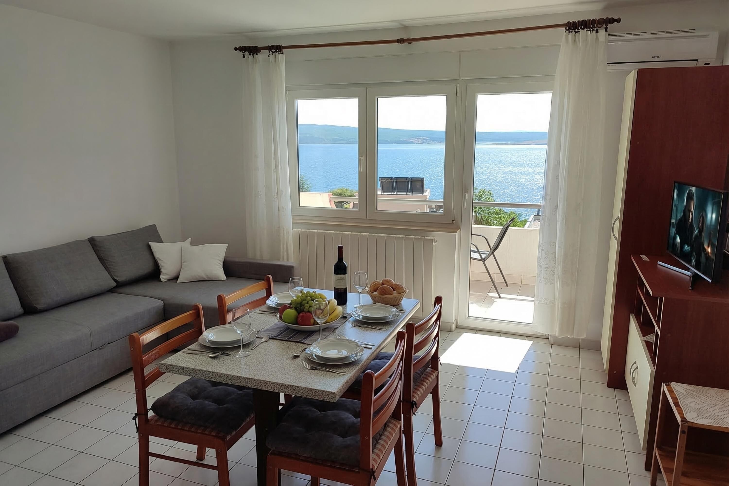 Standard Apartment, Multiple Bedrooms (Sea View Apartment Neti) | Living area | 21-inch flat-screen TV with digital channels, TV