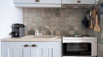 Traditional Apartment, 2 Bedrooms, Sea View, Beachfront | Private kitchenette | Fridge, microwave, oven, stovetop